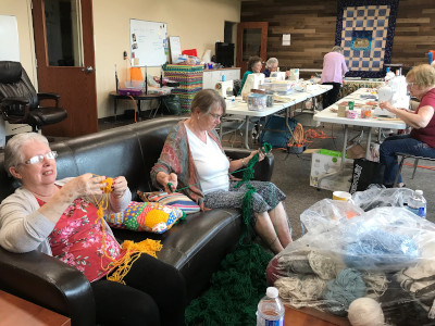 ladies doing hand crafts